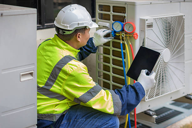 Professional Hvac technician working in Four Oaks, NC